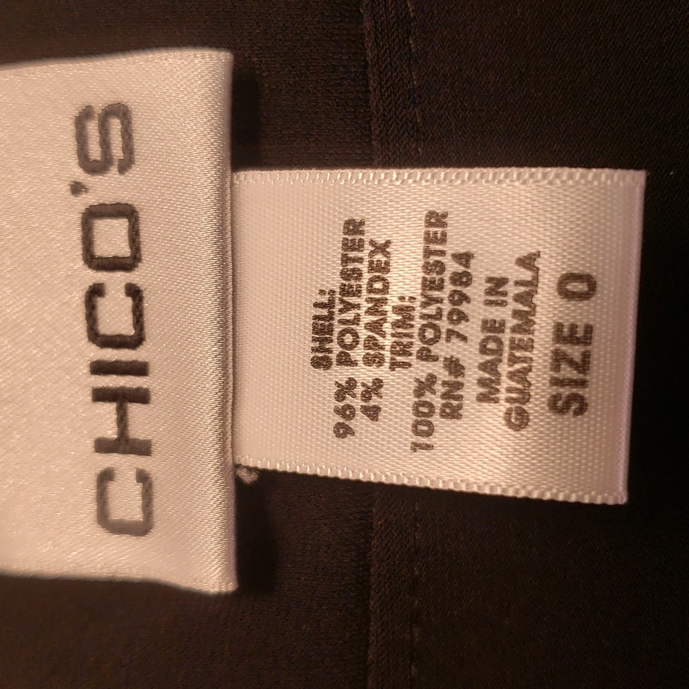 Chico's size 0 black take top.       B54 - Picture 5 of 8